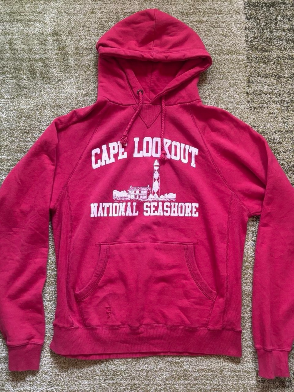 Cape Lookout National Seashore hoodie with white text and lighthouse graphic